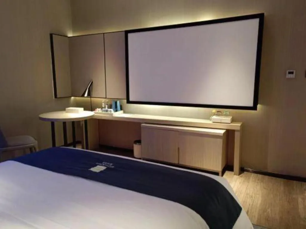 Bed in Echarm Hotel Liuzhou High-speed Railway Station
