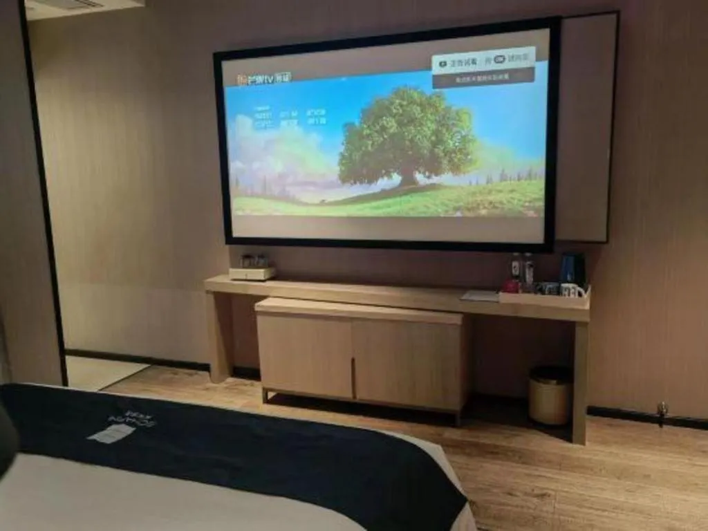 Bed in Echarm Hotel Liuzhou High-speed Railway Station