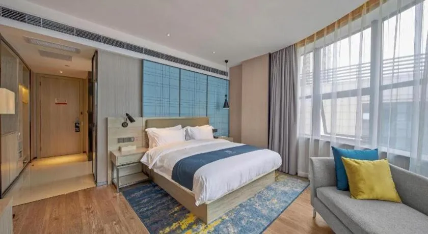 Bed in Echarm Hotel Liuzhou High-speed Railway Station