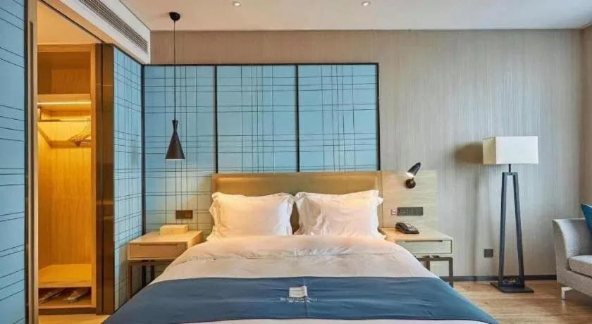 Bed in Echarm Hotel Liuzhou High-speed Railway Station