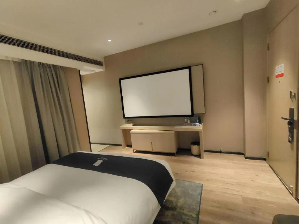 Bed in Echarm Hotel Liuzhou High-speed Railway Station
