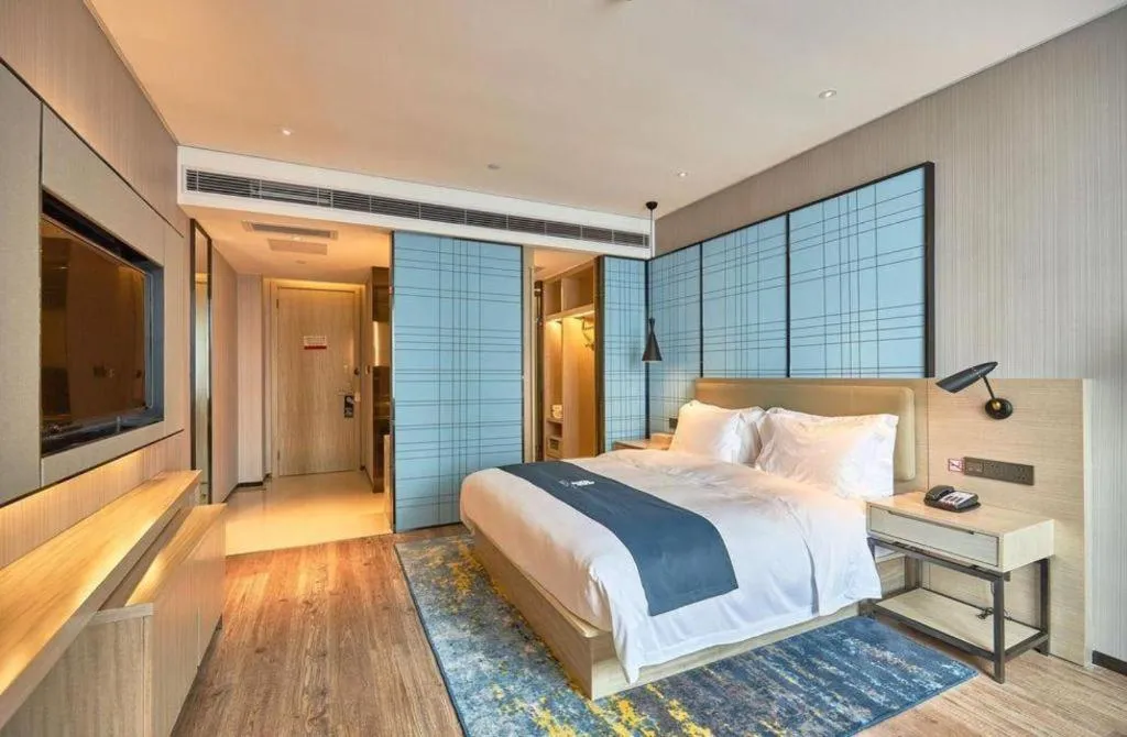 Bed in Echarm Hotel Liuzhou High-speed Railway Station