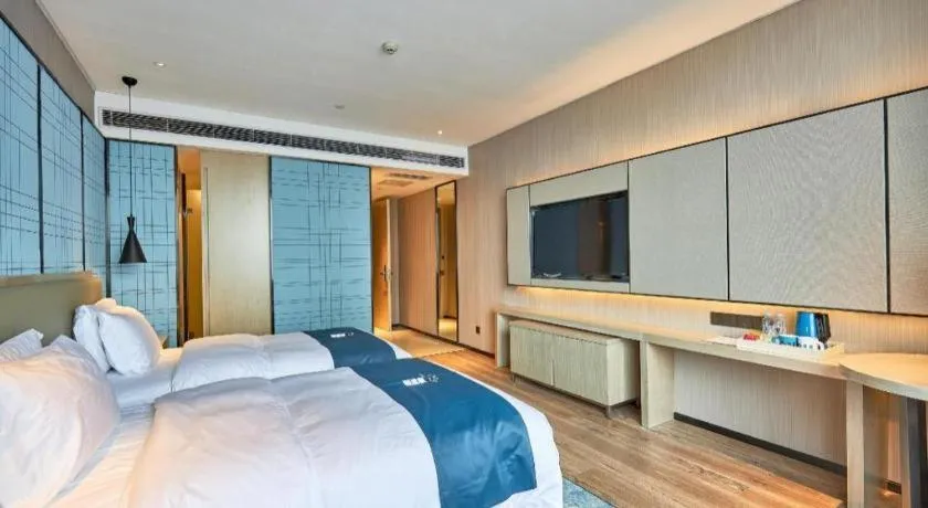 Bed in Echarm Hotel Liuzhou High-speed Railway Station