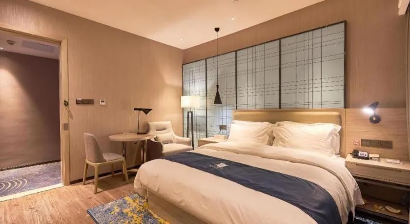 Bed in Echarm Hotel Liuzhou High-speed Railway Station