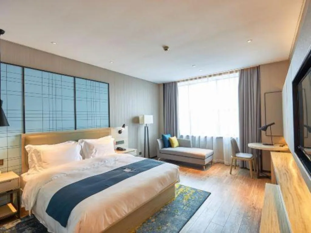 Bed in Echarm Hotel Liuzhou High-speed Railway Station