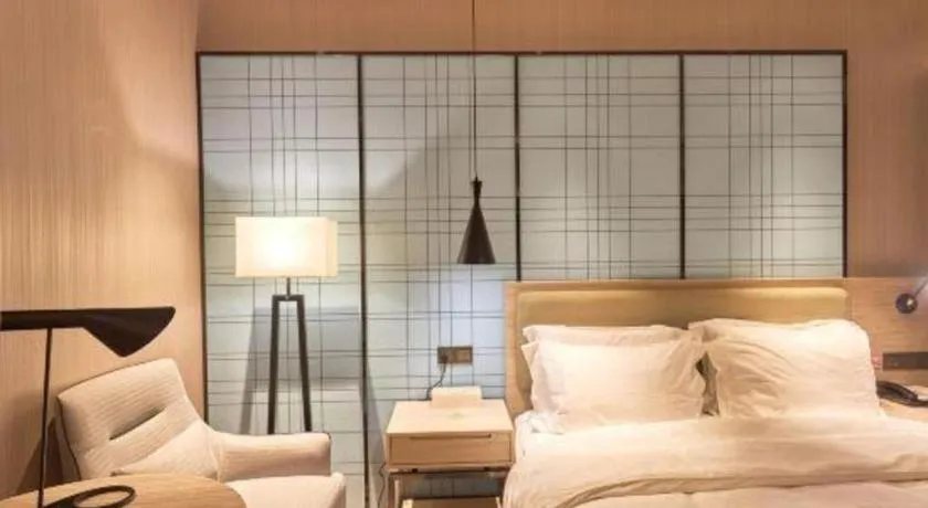 Bed in Echarm Hotel Liuzhou High-speed Railway Station