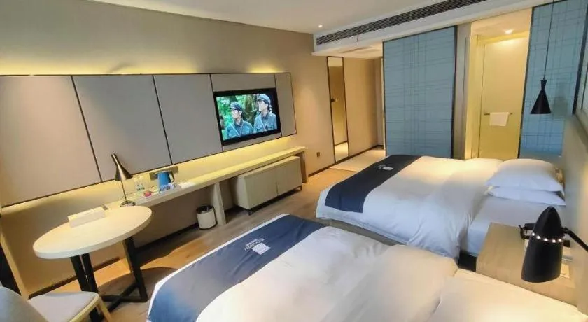 Bed in Echarm Hotel Liuzhou High-speed Railway Station