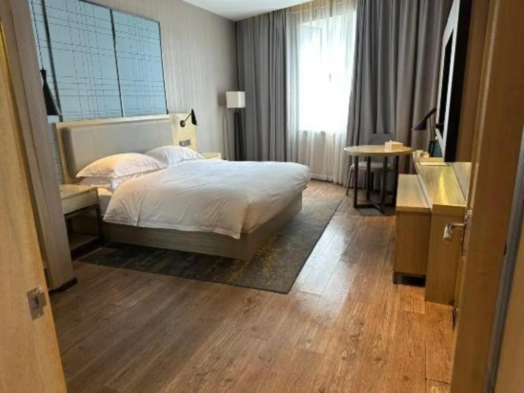Bed in Echarm Hotel Liuzhou High-speed Railway Station