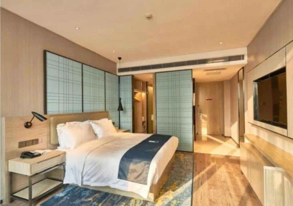 Bed in Echarm Hotel Liuzhou High-speed Railway Station