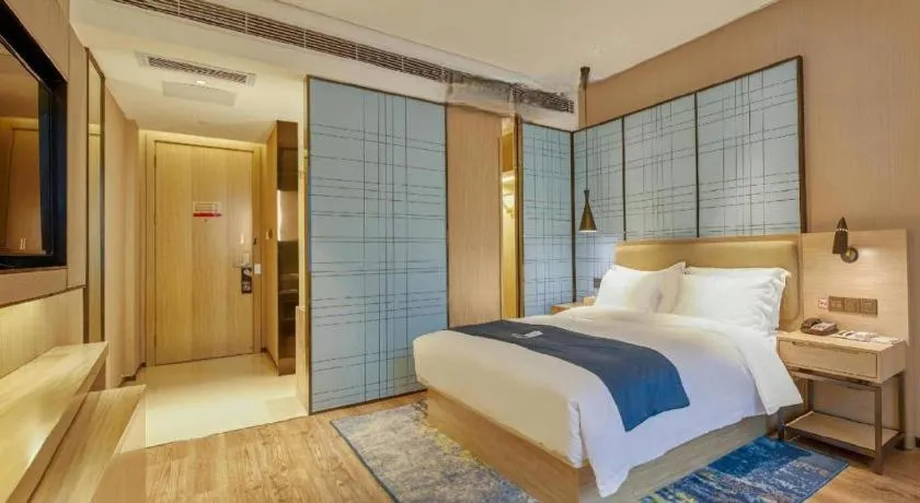 Bed in Echarm Hotel Liuzhou High-speed Railway Station