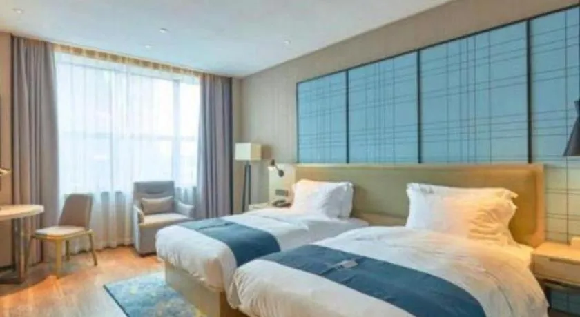 Bed in Echarm Hotel Liuzhou High-speed Railway Station