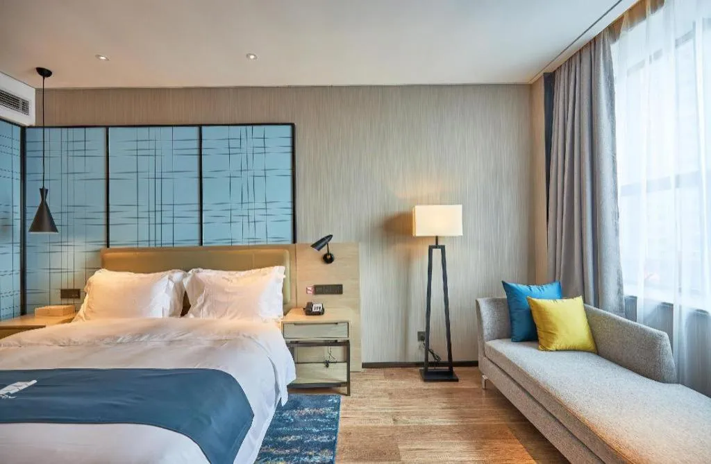 Bed in Echarm Hotel Liuzhou High-speed Railway Station