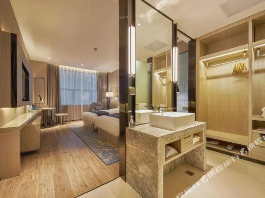 Bed in Echarm Hotel Liuzhou High-speed Railway Station