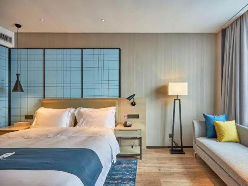 Bed in Echarm Hotel Liuzhou High-speed Railway Station