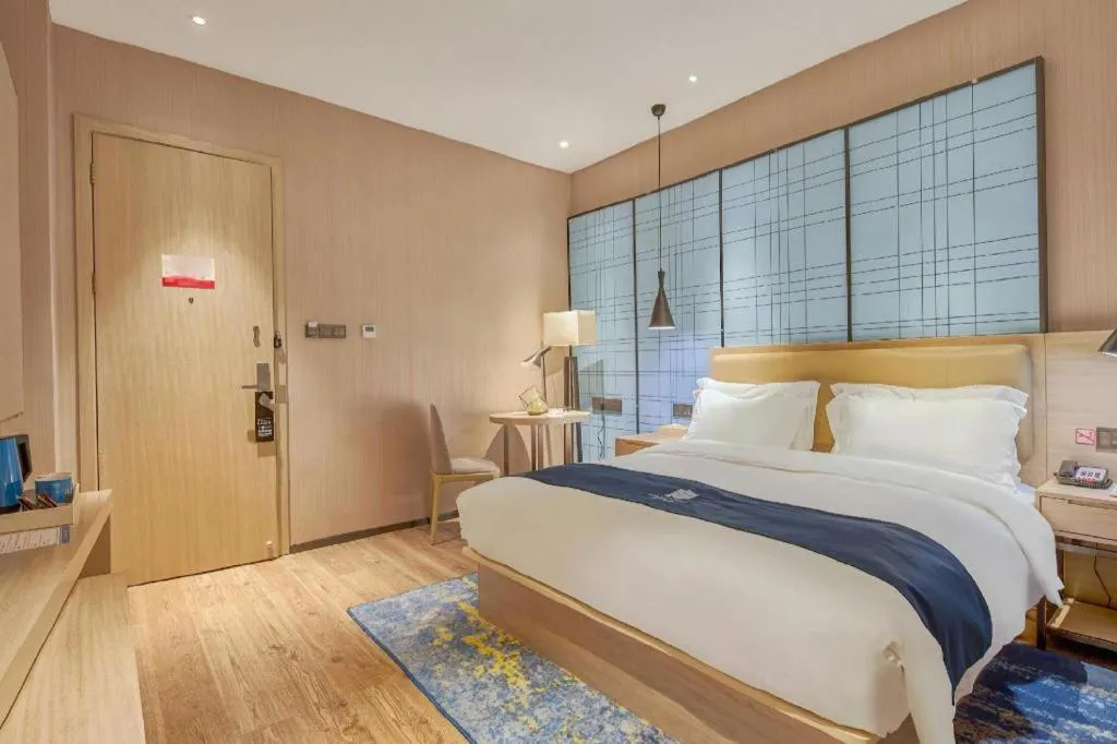 Bed in Echarm Hotel Liuzhou High-speed Railway Station