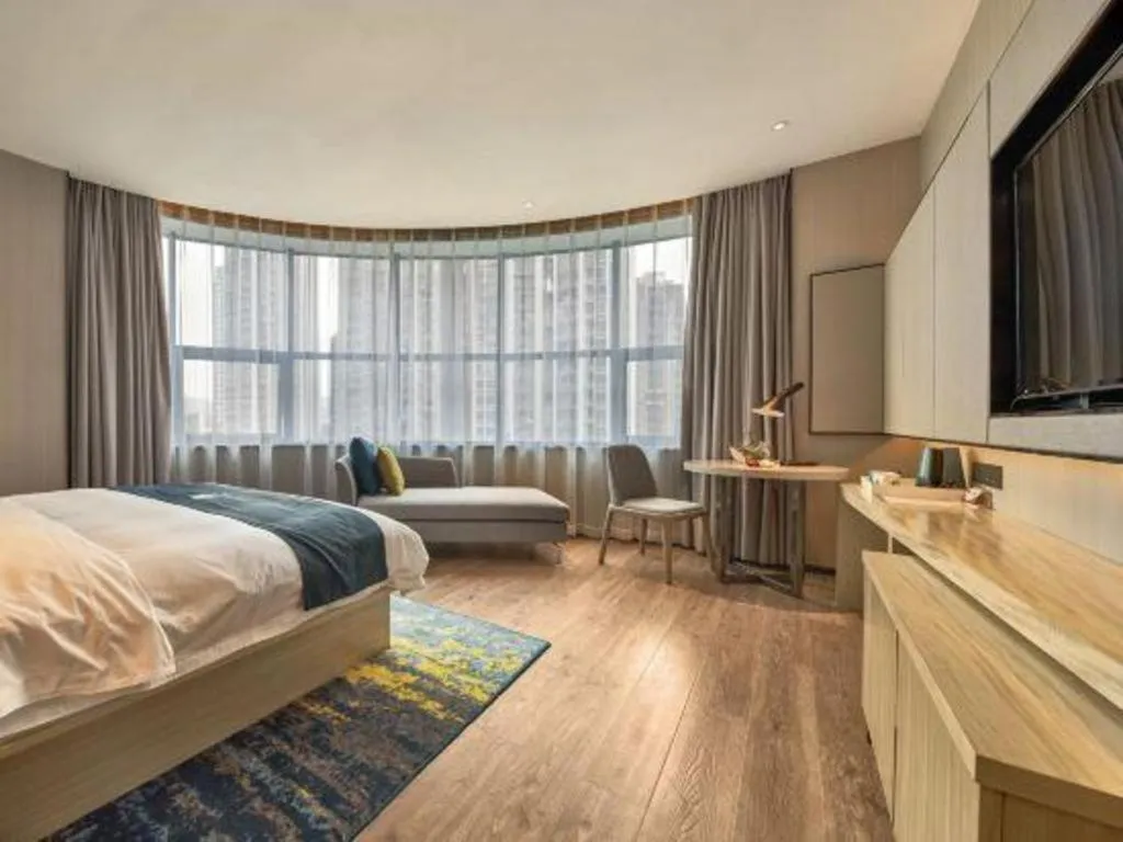 Bed in Echarm Hotel Liuzhou High-speed Railway Station