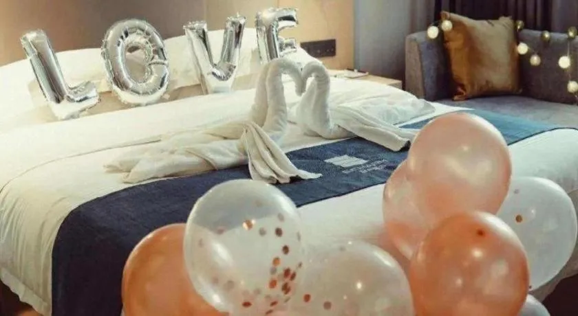 Bed in Echarm Hotel Liuzhou High-speed Railway Station