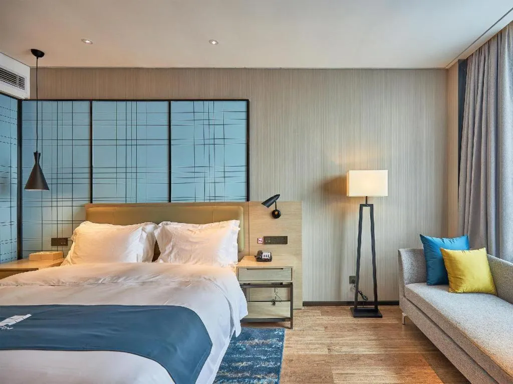 Bed in Echarm Hotel Liuzhou High-speed Railway Station