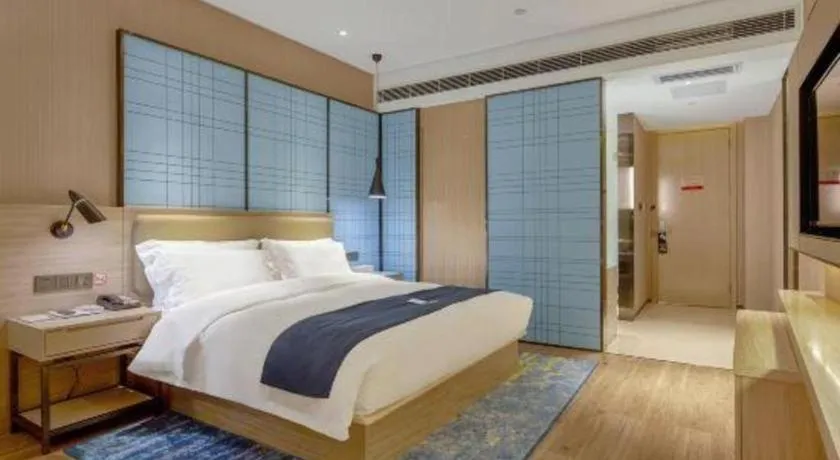 Bed in Echarm Hotel Liuzhou High-speed Railway Station
