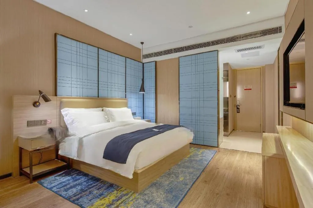Bed in Echarm Hotel Liuzhou High-speed Railway Station