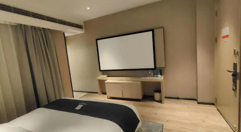 Bed in Echarm Hotel Liuzhou High-speed Railway Station
