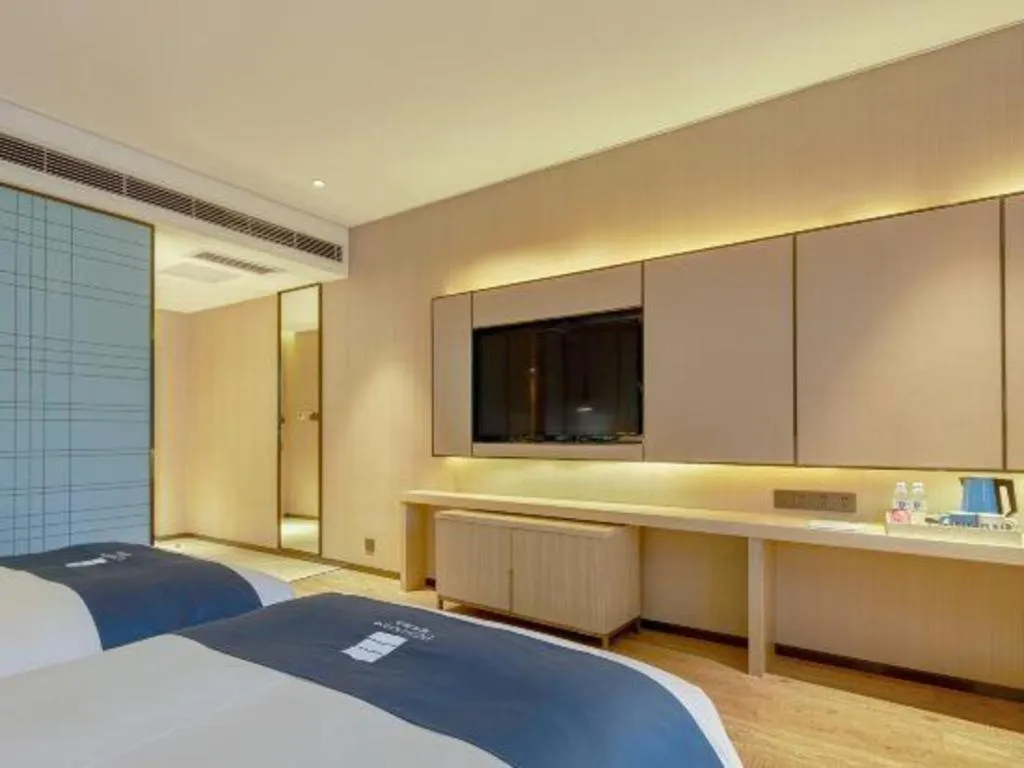 Bed in Echarm Hotel Liuzhou High-speed Railway Station