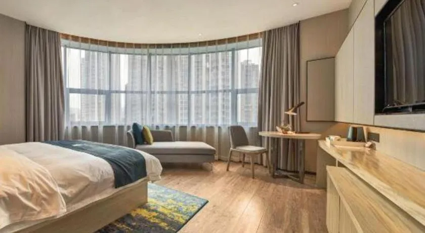 Bed in Echarm Hotel Liuzhou High-speed Railway Station