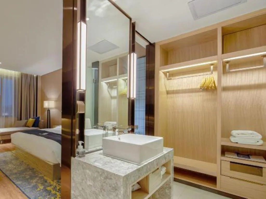 Bed in Echarm Hotel Liuzhou High-speed Railway Station