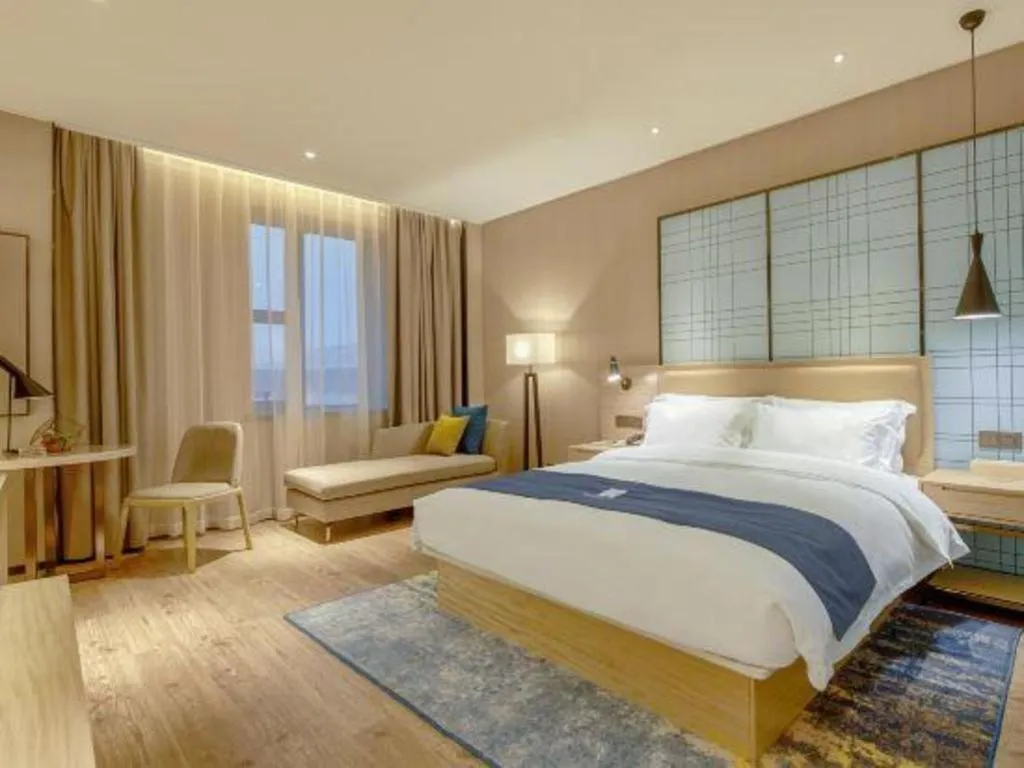 Bed in Echarm Hotel Liuzhou High-speed Railway Station