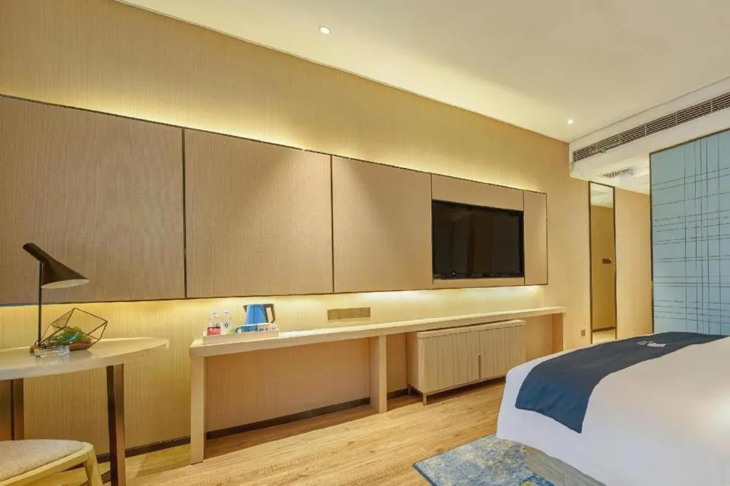 Bed in Echarm Hotel Liuzhou High-speed Railway Station