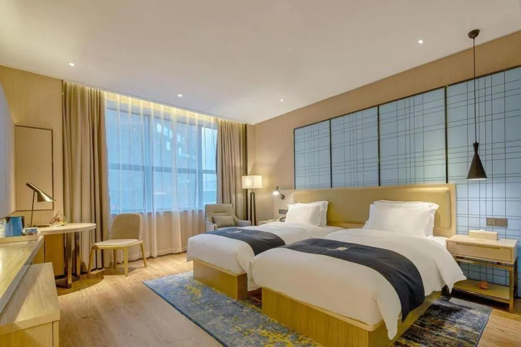 Bed in Echarm Hotel Liuzhou High-speed Railway Station