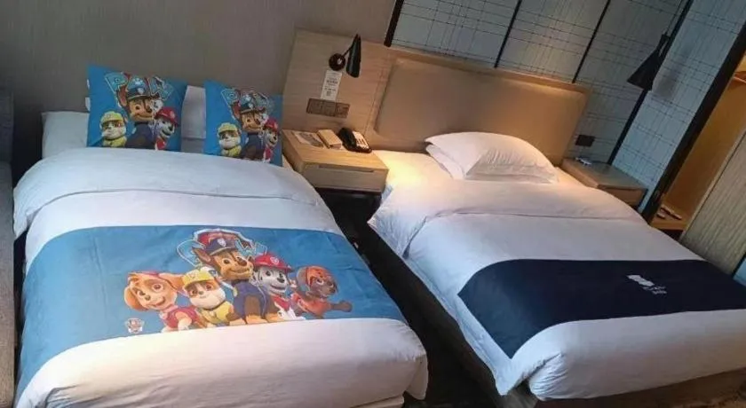 Bed in Echarm Hotel Liuzhou High-speed Railway Station