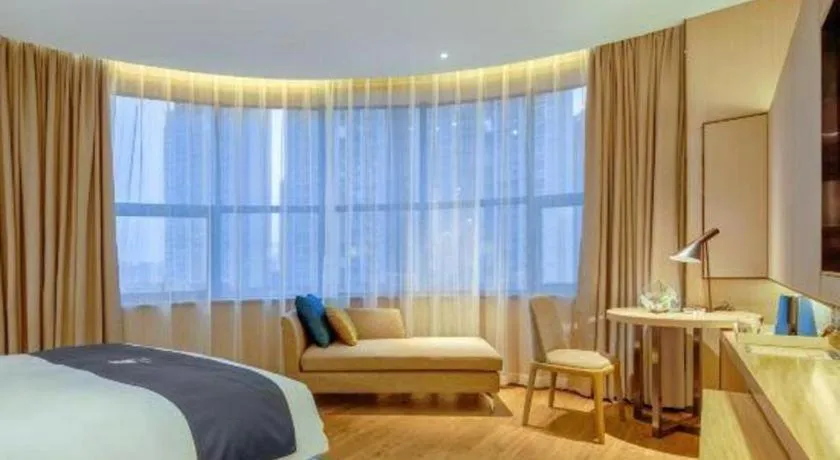 Bed in Echarm Hotel Liuzhou High-speed Railway Station