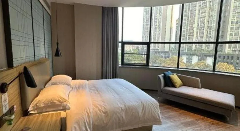 Bed in Echarm Hotel Liuzhou High-speed Railway Station