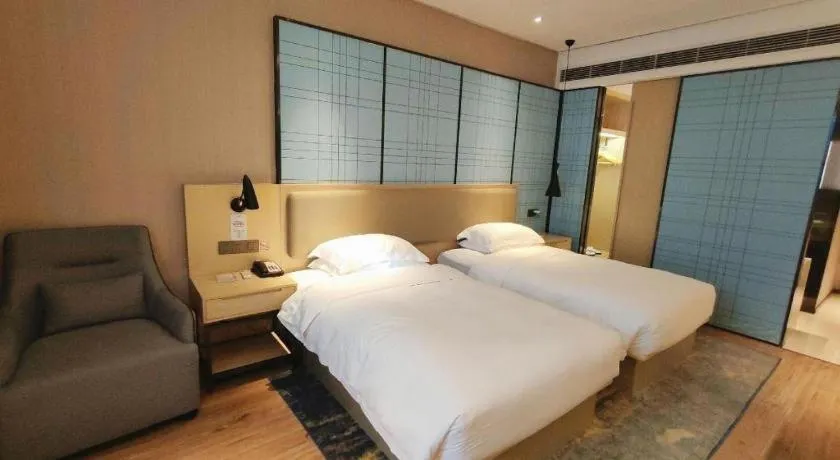 Bed in Echarm Hotel Liuzhou High-speed Railway Station