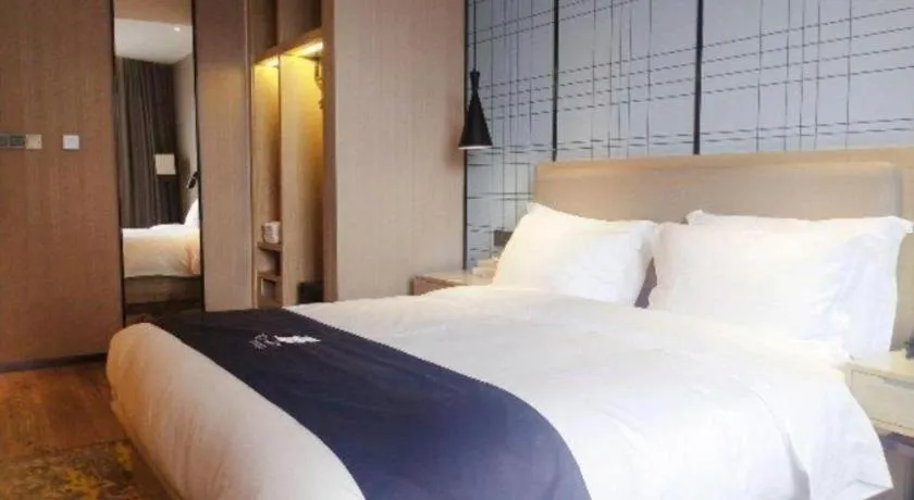 Bed in Echarm Hotel Liuzhou High-speed Railway Station