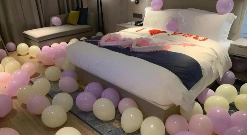 Bed in Echarm Hotel Liuzhou High-speed Railway Station