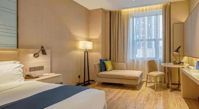 Bed in Echarm Hotel Liuzhou High-speed Railway Station