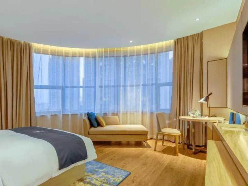 Bed in Echarm Hotel Liuzhou High-speed Railway Station