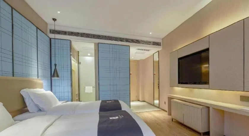 Bed in Echarm Hotel Liuzhou High-speed Railway Station
