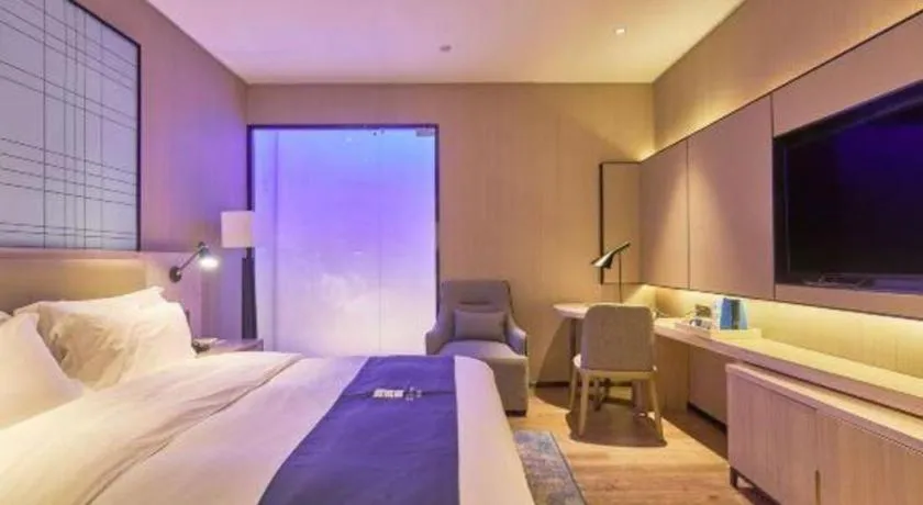 Bed in Echarm Hotel Liuzhou High-speed Railway Station