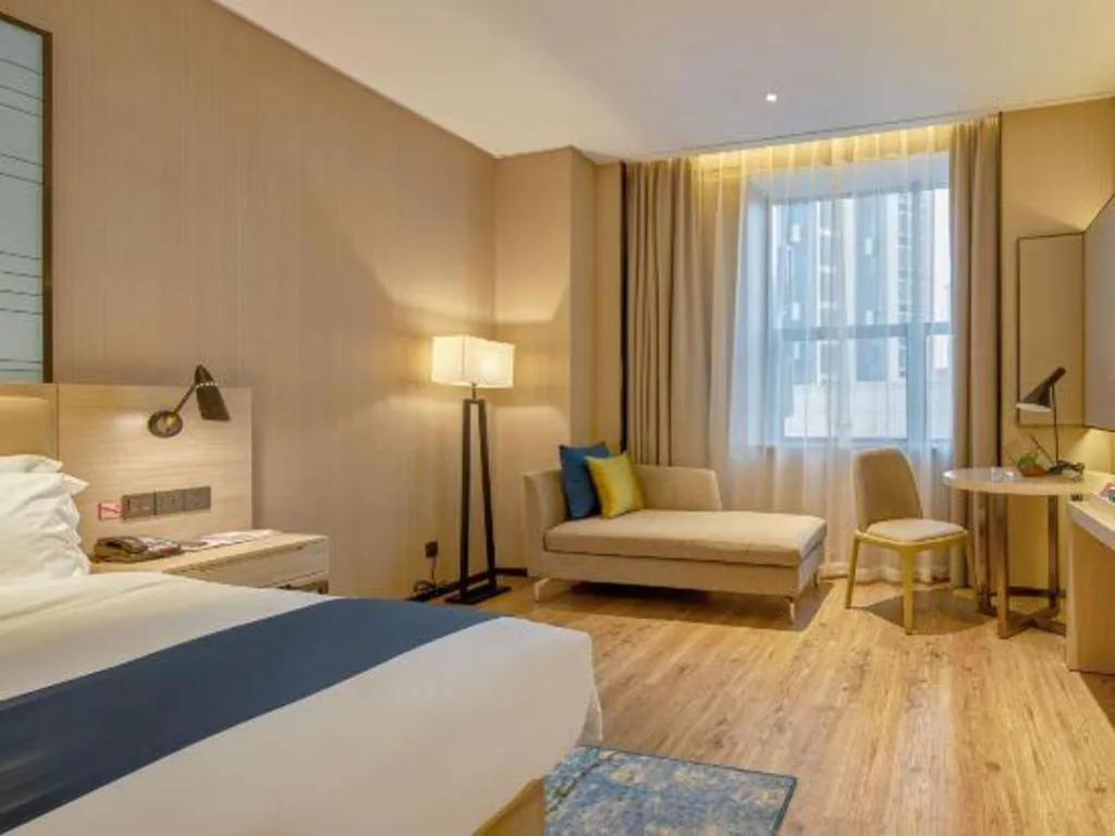 Bed in Echarm Hotel Liuzhou High-speed Railway Station