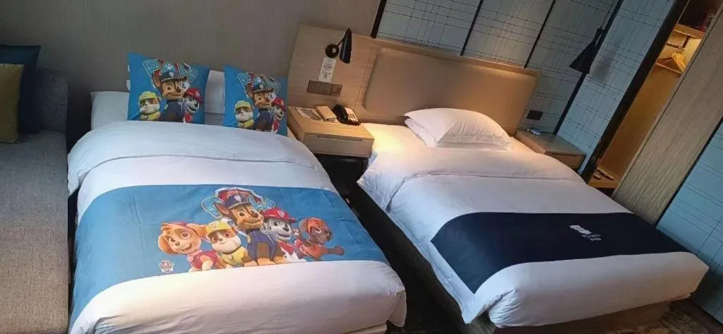 Bed in Echarm Hotel Liuzhou High-speed Railway Station