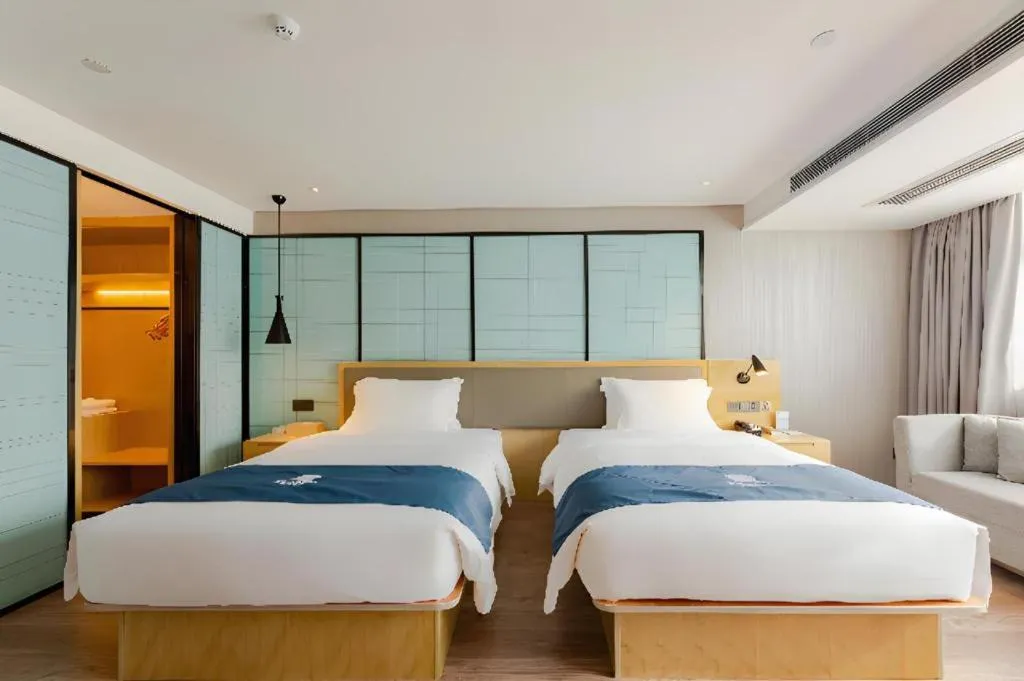 Bed in Echarm Hotel Nanning Qingxiu Mountain