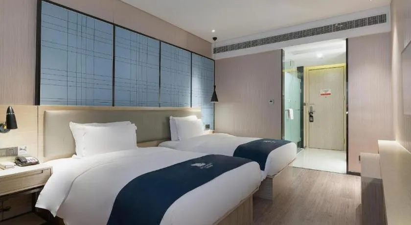 Bed in Echarm Hotel Nanning Qingxiu Mountain