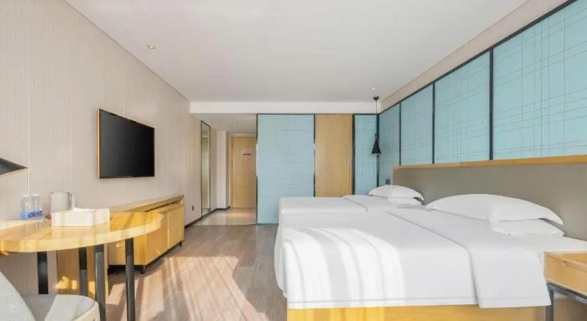 Bed in Echarm Hotel Nanning Qingxiu Mountain