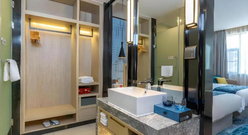 Bed in Echarm Hotel Nanning Qingxiu Mountain