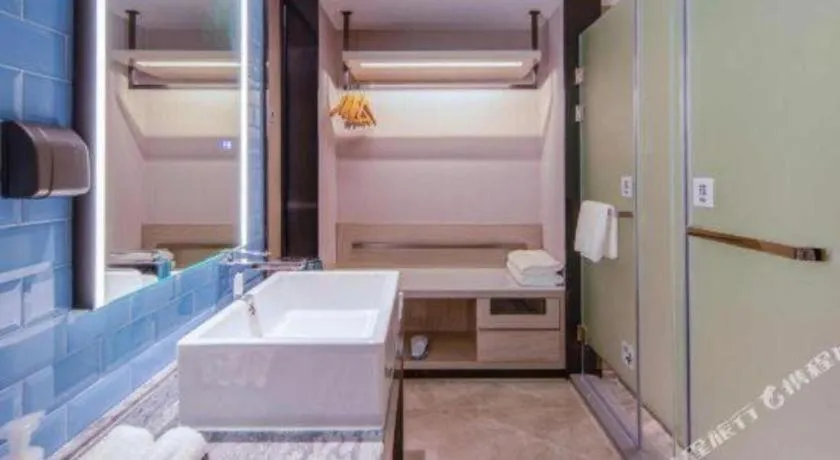 Bed in Echarm Hotel Nanning Qingxiu Mountain