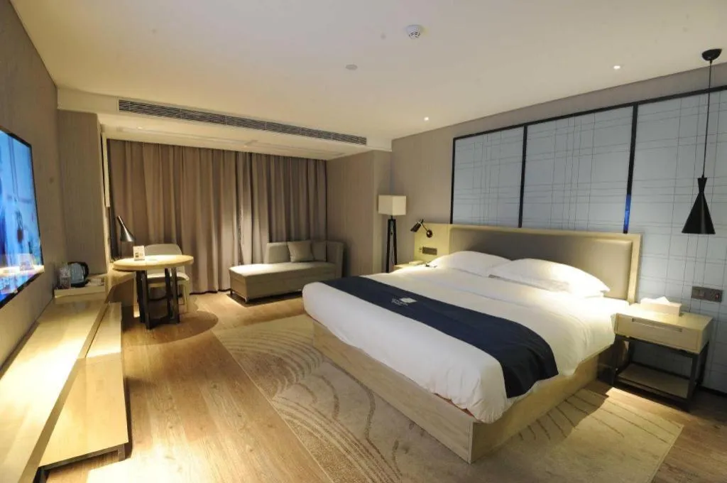 Bed in Echarm Hotel Nanning Qingxiu Mountain