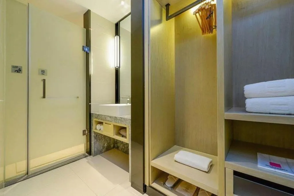 Bed in Echarm Hotel Nanning Qingxiu Mountain